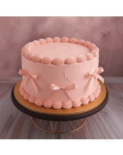Tort Różowy z Kokardkami – Elegancja i Minimalizm